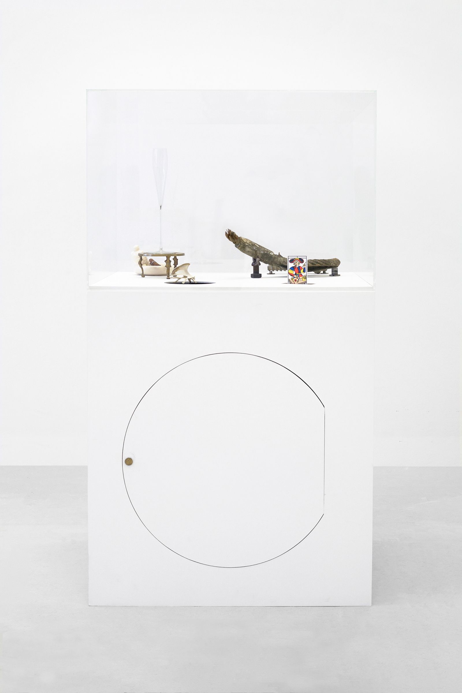 a display cabinet with various items